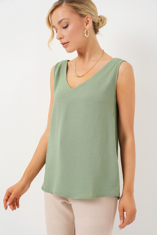 Merterium V Yaka Sıfır Kol Bluz 950 - Çağla