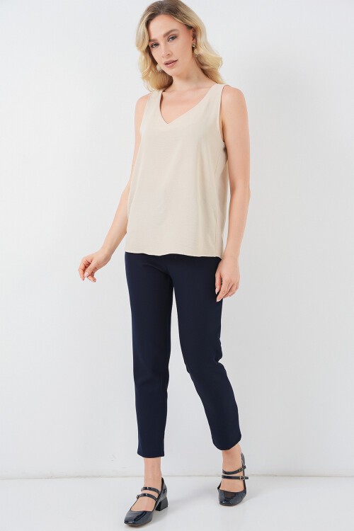 V Yaka Sıfır Kol Bluz 950 - Ekru